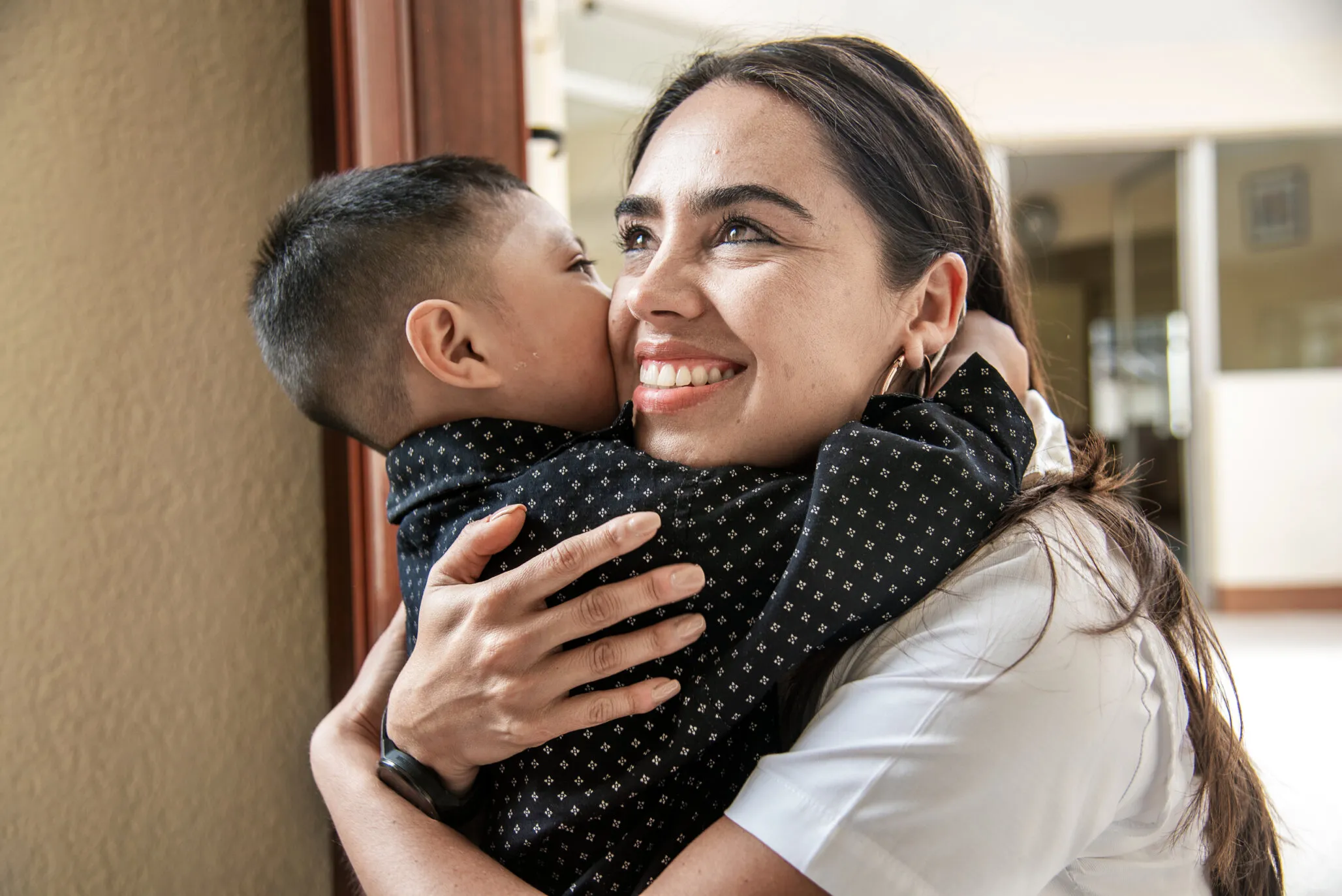 Operation Smile Guatemala Executive Director Bea Vidal embraces a patient during a surgical program in Guatemala City.