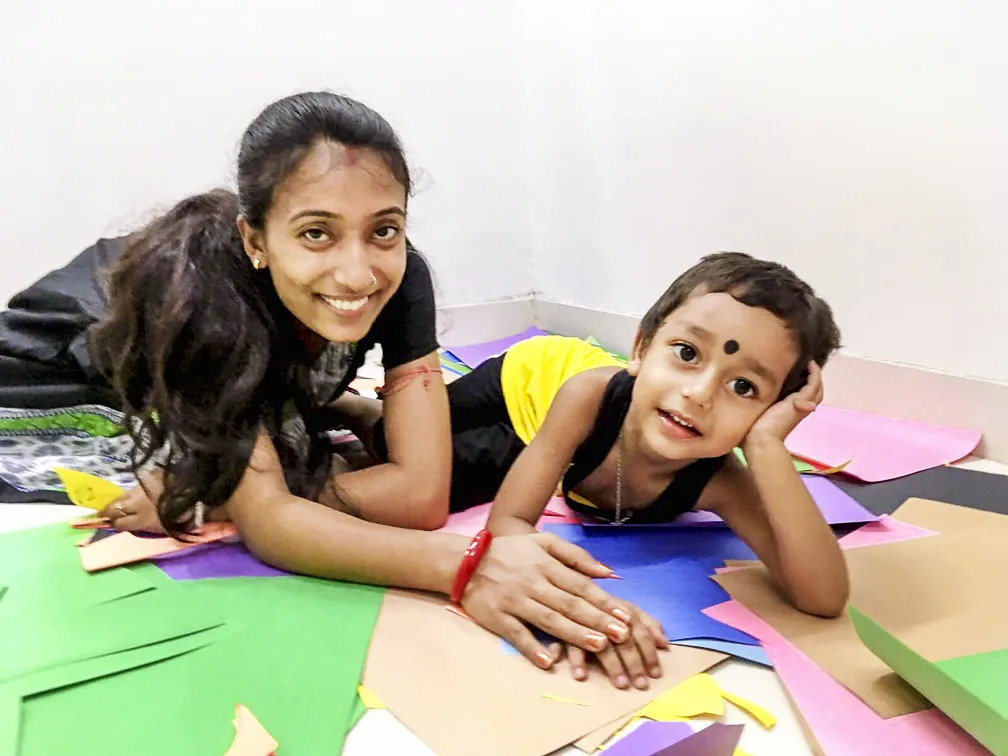 Tarpasi poses for a photo with her 3-year-old son, Arju, during the Future of Smiles medical mission in Durgapur, West Bengal, India, in August 2017.