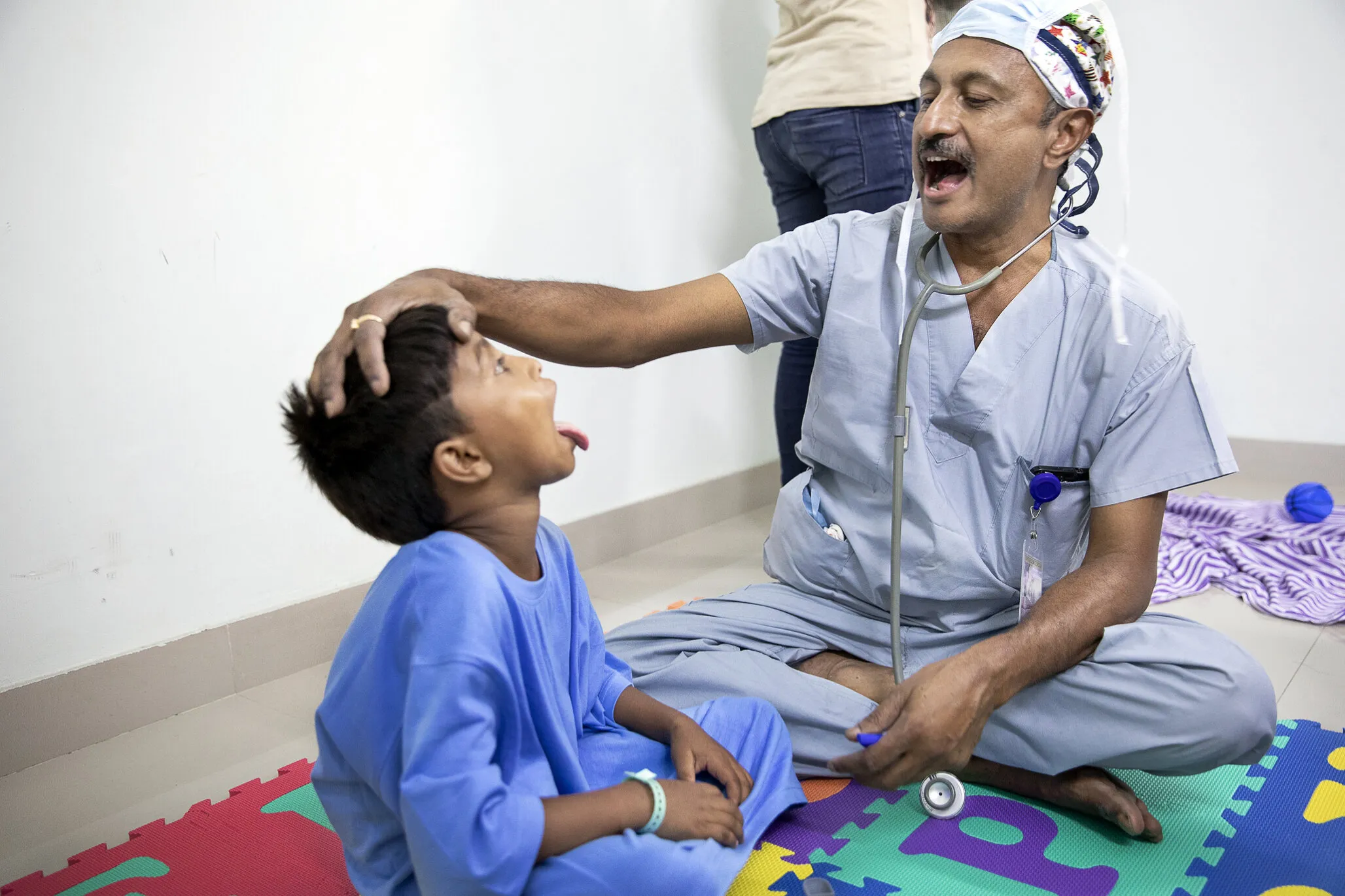 Bipul is examined during a surgical program in 2018 in Durgapur, India.