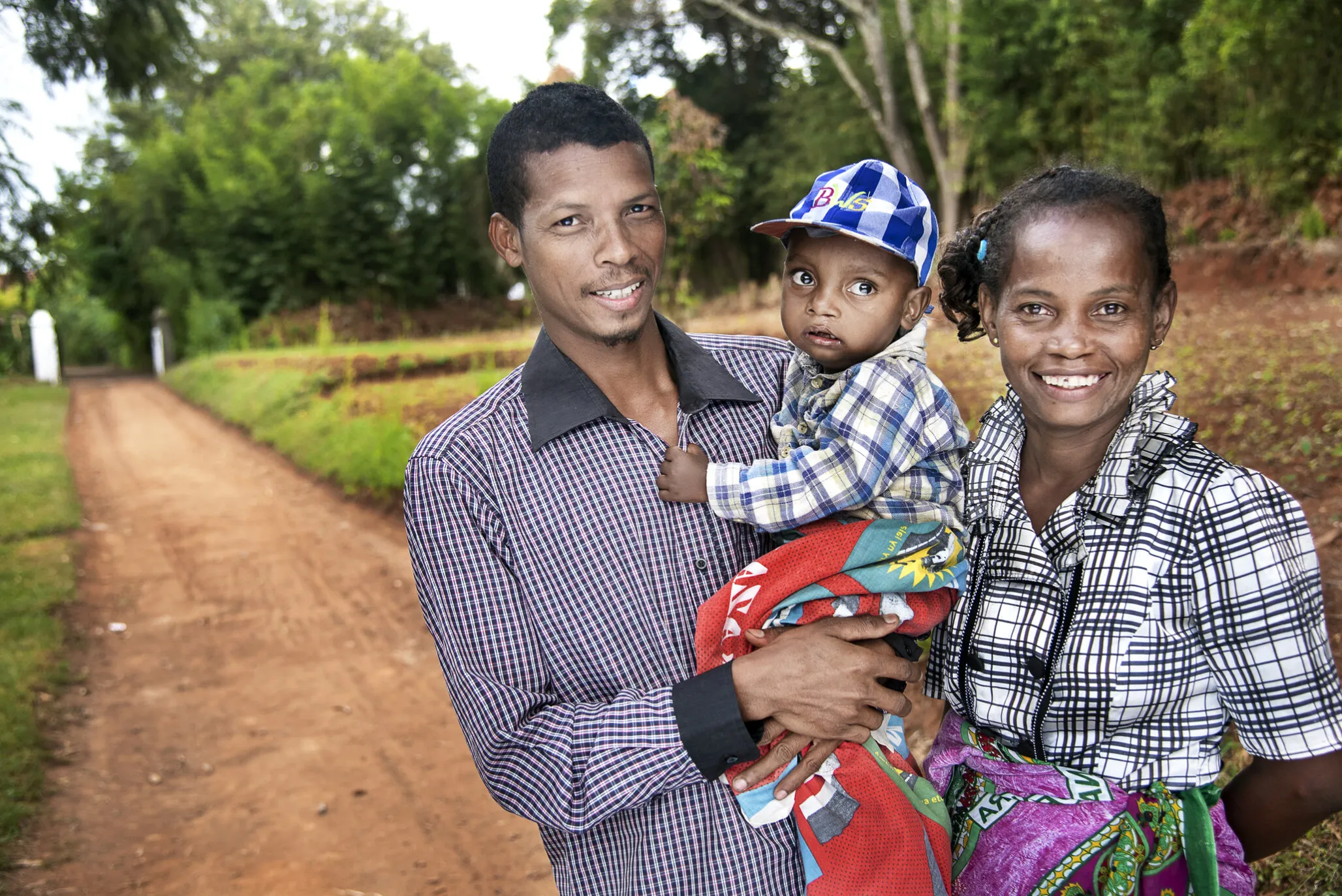 Fidelis poses with his wife, Bao, and their son, Tsilavina, who received surgery for his cleft lip in 2017 from Operation Smile.