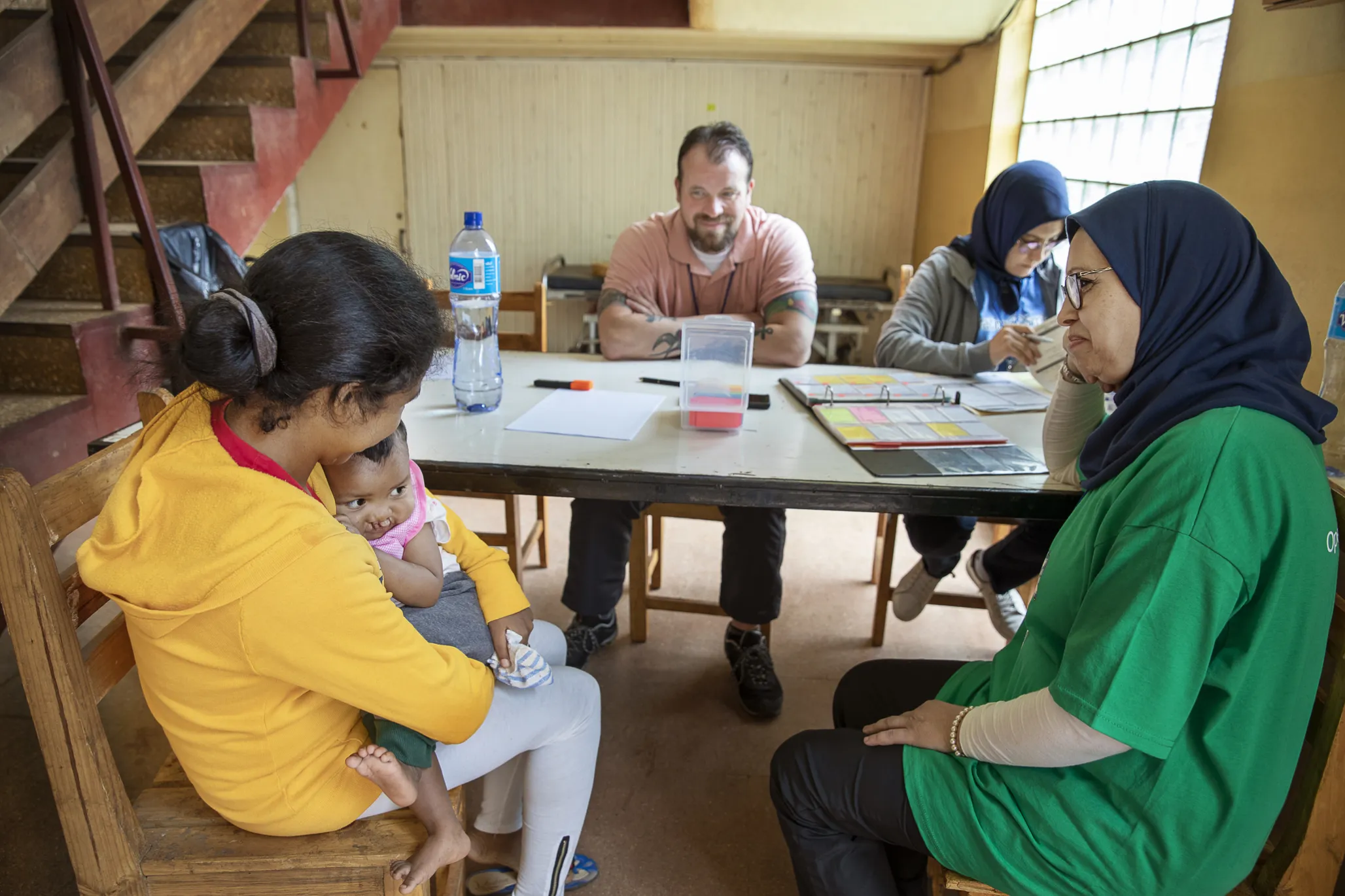 Brian Zimmerman speaks with patients and families during a surgical program in Madagascar.