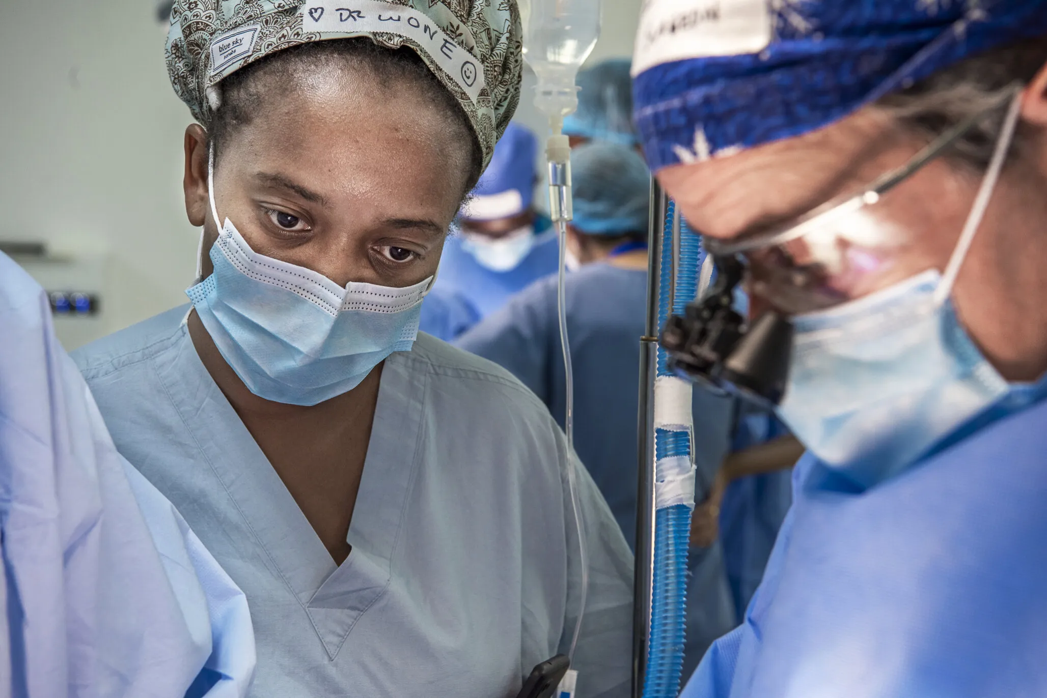 During an Operation Smile surgical program in Malawi, cleft surgeons Drs. Wone Banda of Malawi, left, and Benjamin Rodriguez of the U.S. perform surgery.