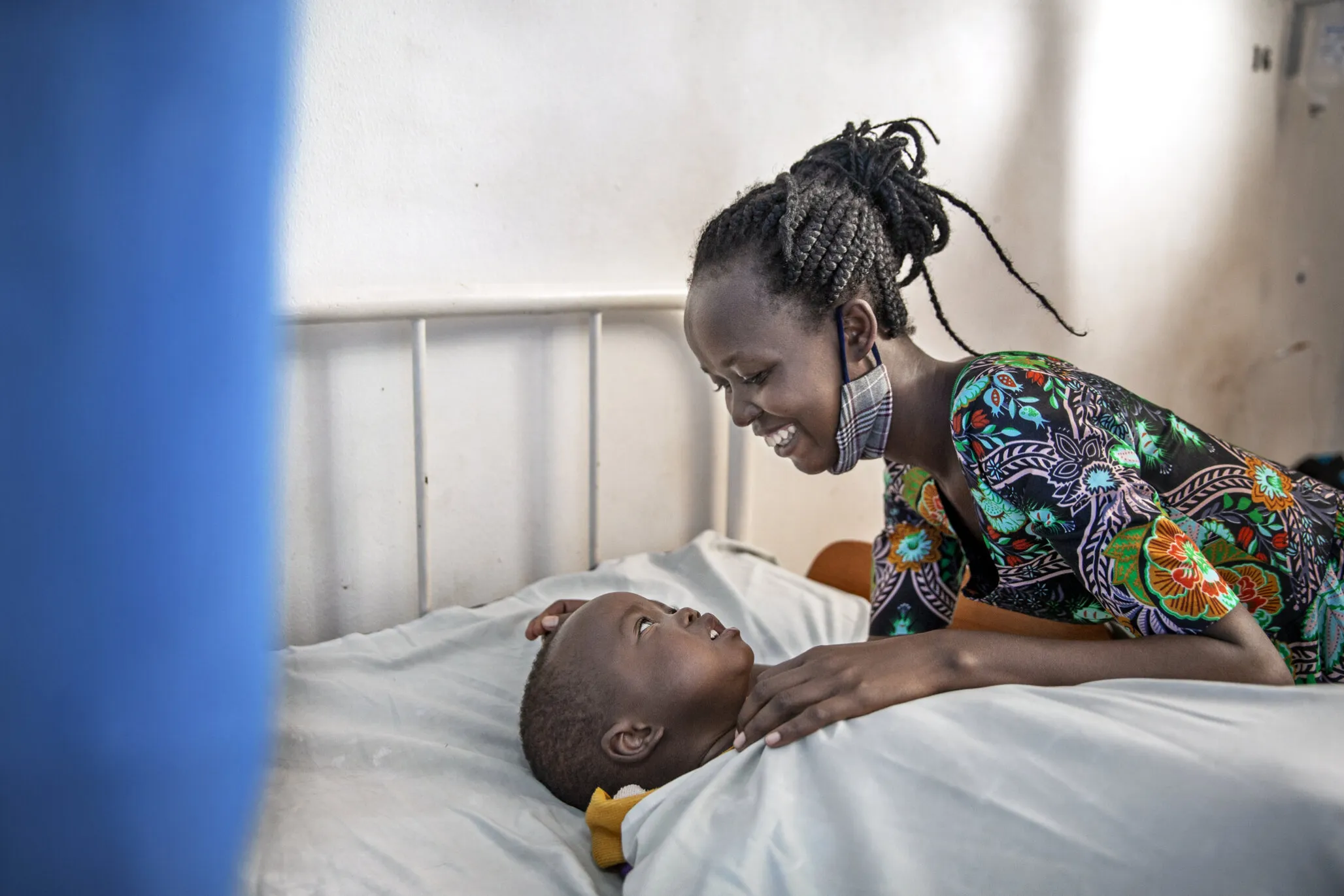 Joshua, after surgery, with his mom.