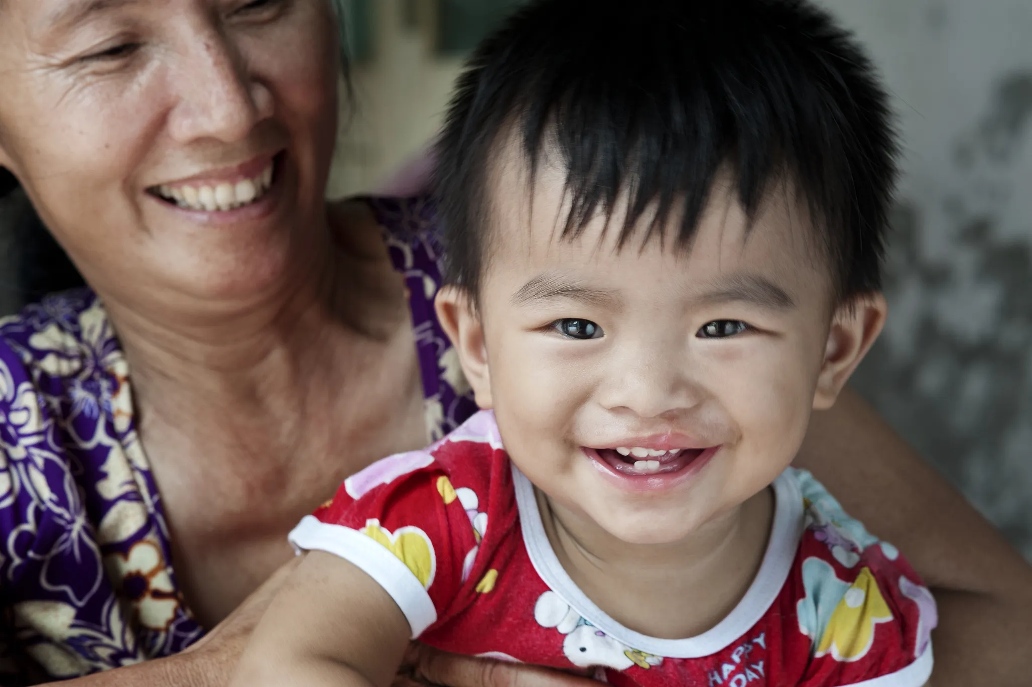 Bao smiles at the camera after surgery.