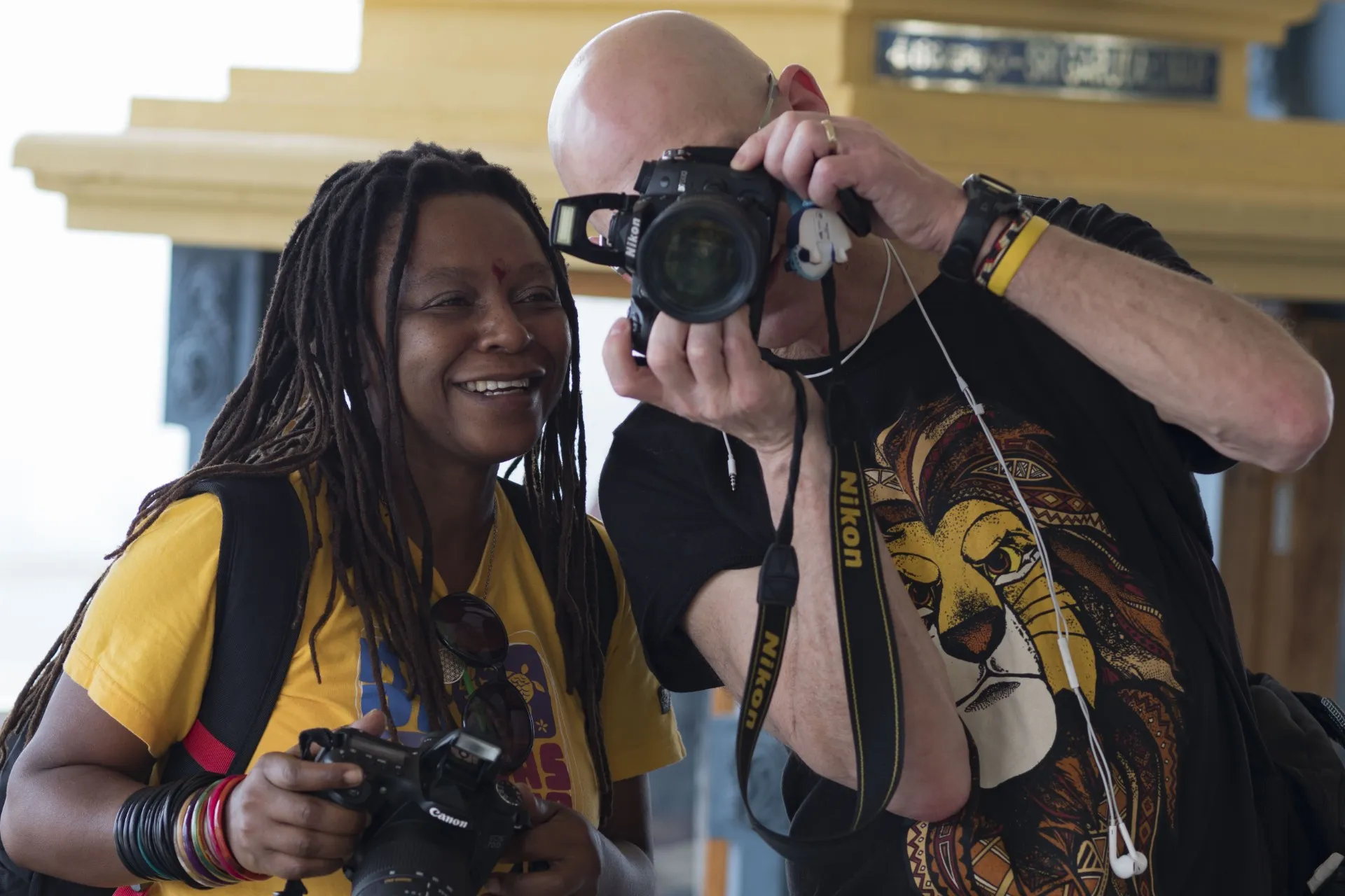 Photographers share a moment together during a surgical program.