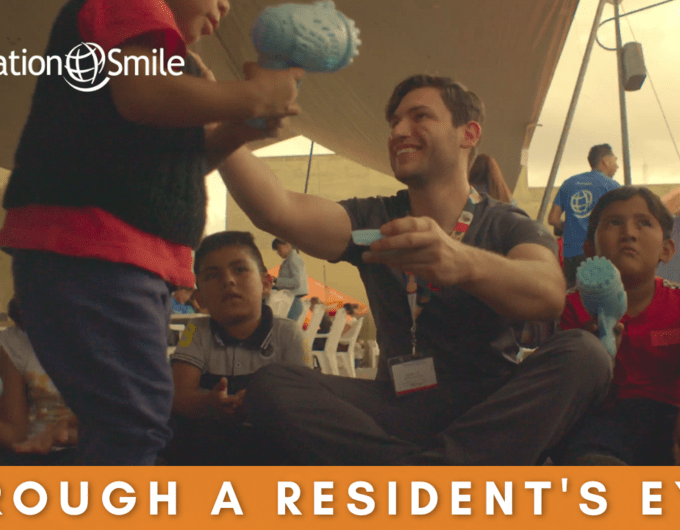 A resident plays with children at our surgical program in Puebla, Mexico.