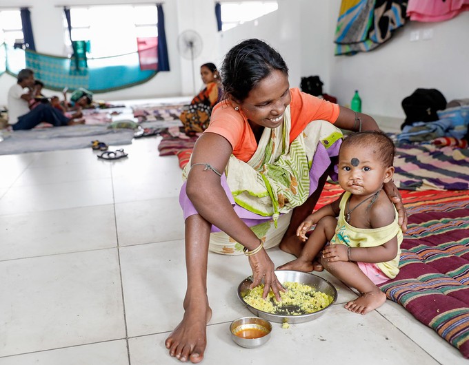 A mother and her child wait patiently at the shelter during a 2018 Operation Smile India surgical program in Durgapur. Photo: Jasmin Shah.
