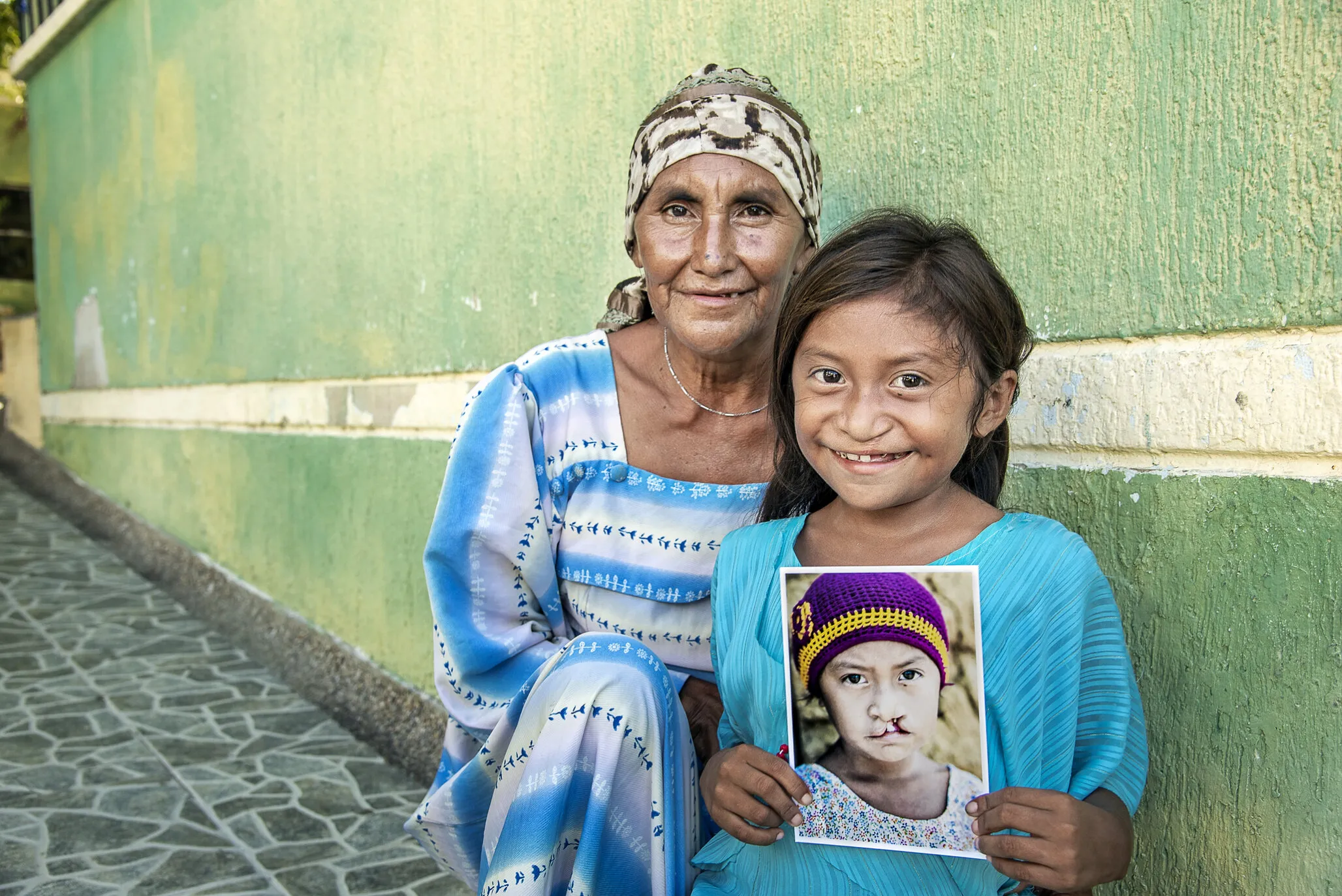 Lexxi, age 9, with her mom, Elba.