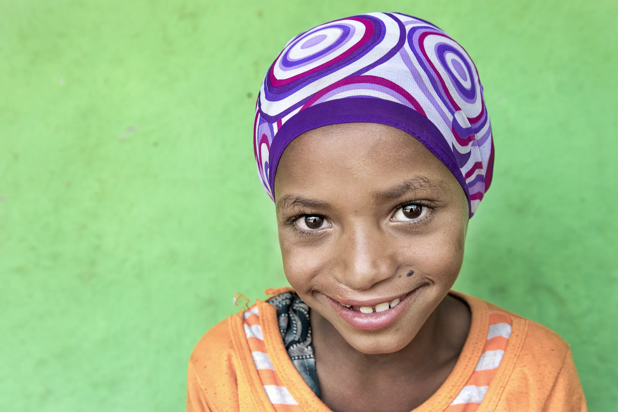 Nazifa smiles for the camera after surgery.