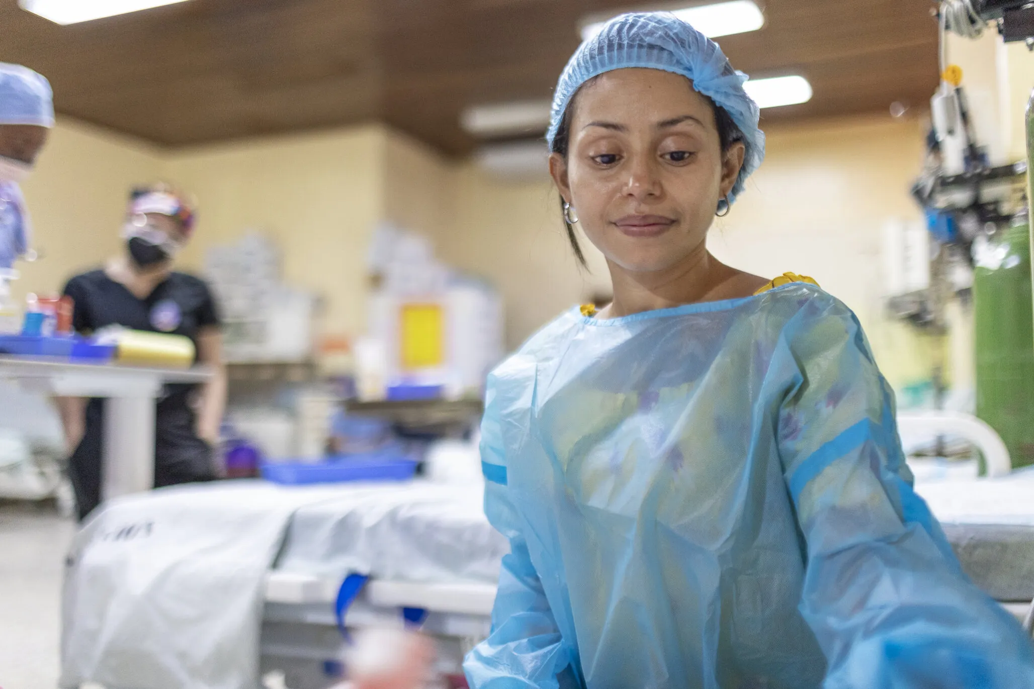 Ana looks on at her daughter, Zoe, after surgery.