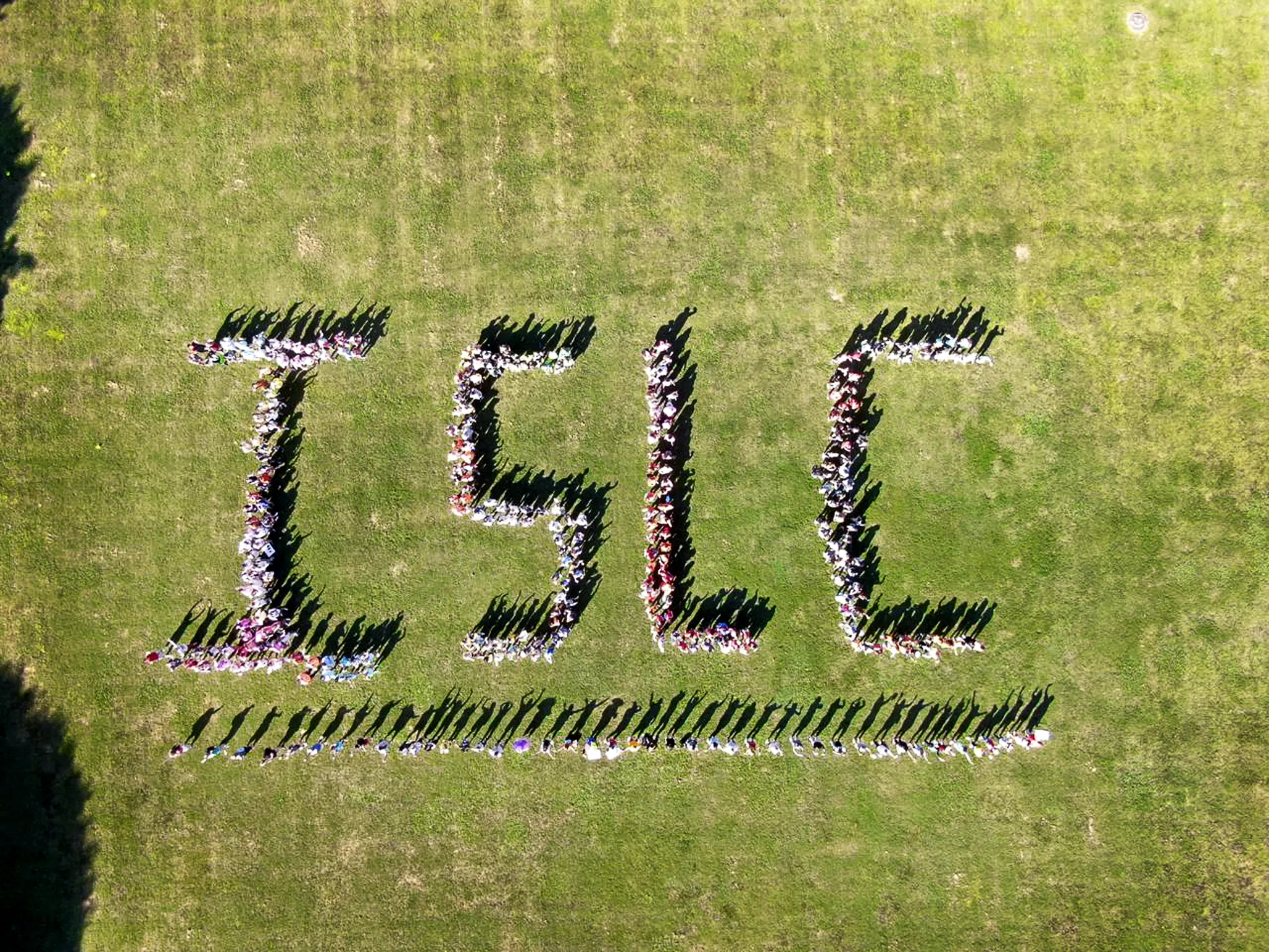 Students form the letters ISLC during the 2019 International Student Leadership Conference in North Carolina.